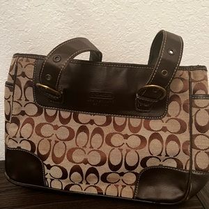 Brown Coach shoulder bag.